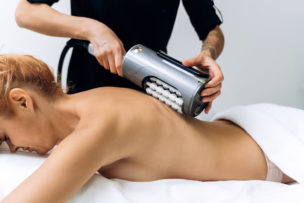 side-view-beautiful-woman-is-receiving-massaging-procedure-spa-salon-she-is-lying-with-pleasure-beautician-is-holding-special-equipment-her-back_2221-9113-2 Massage amincissant en institut de beauté à Annecy
